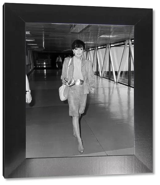 Actress Joan Collins at an airport. May 1982