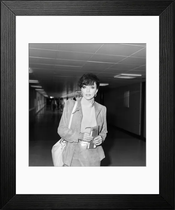 Framed Print : Actress Joan Collins at an airport. May 1982 Framed Print : Actress Joan Collins at an airport. May 1982