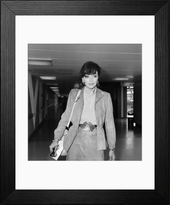 Framed Print : Actress Joan Collins at an airport. May 1982 Framed Print : Actress Joan Collins at an airport. May 1982