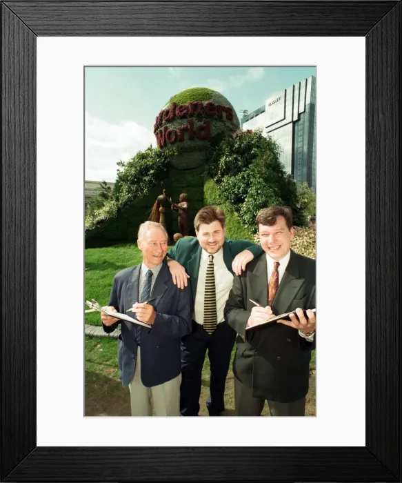 Framed Print : Judges examine the flower displays in Centenary Square, Birmingham Framed Print : Judges examine the flower displays in Centenary Square, Birmingham