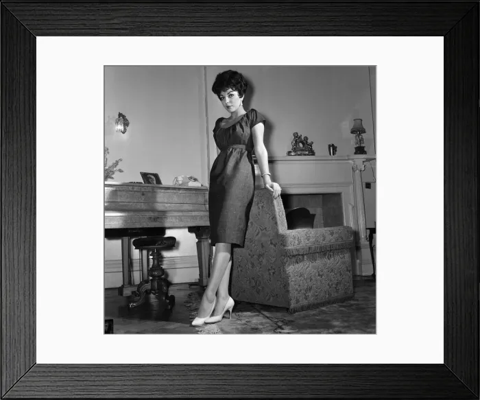 Framed Print : Film star Joan Collins flew into London today from Montego Bay