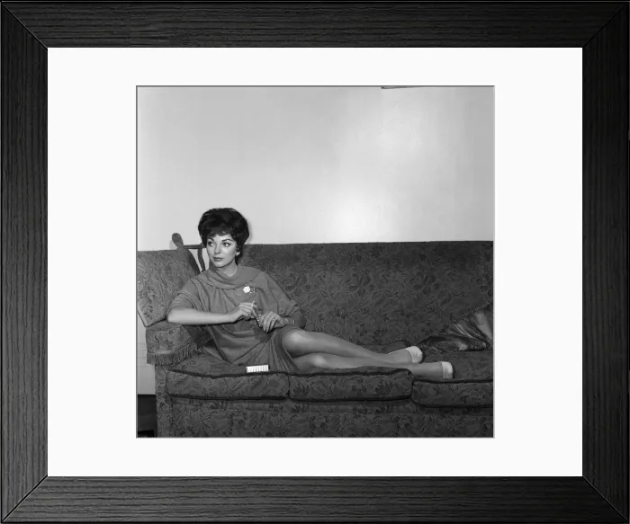 Framed Print : Film star Joan Collins flew into London today from Montego Bay