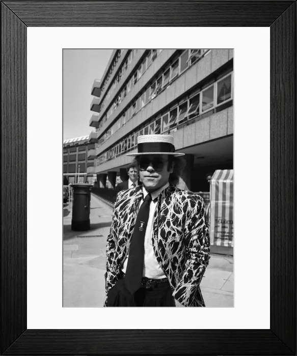 Framed Print : Elton John arriving at court. Elton is asking for a bigger share of the 20 million his Framed Print : Elton John arriving at court. Elton is asking for a bigger share of the 20 million his