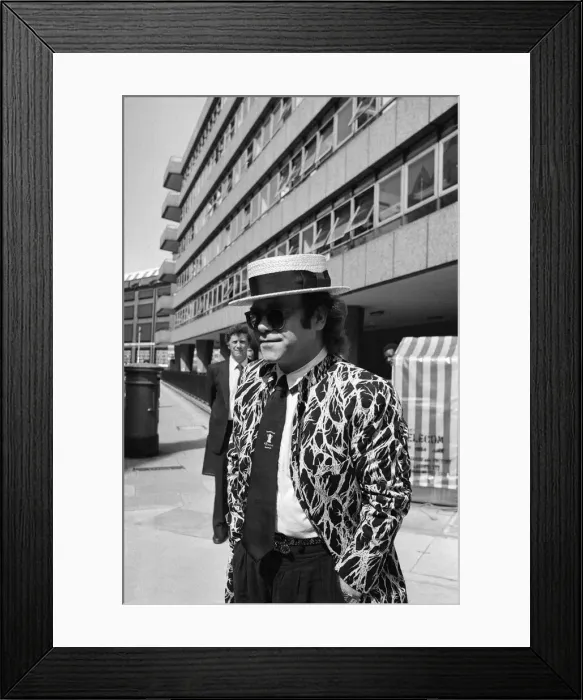 Framed Print : Elton John arriving at court. Elton is asking for a bigger share of the 20 million his Framed Print : Elton John arriving at court. Elton is asking for a bigger share of the 20 million his