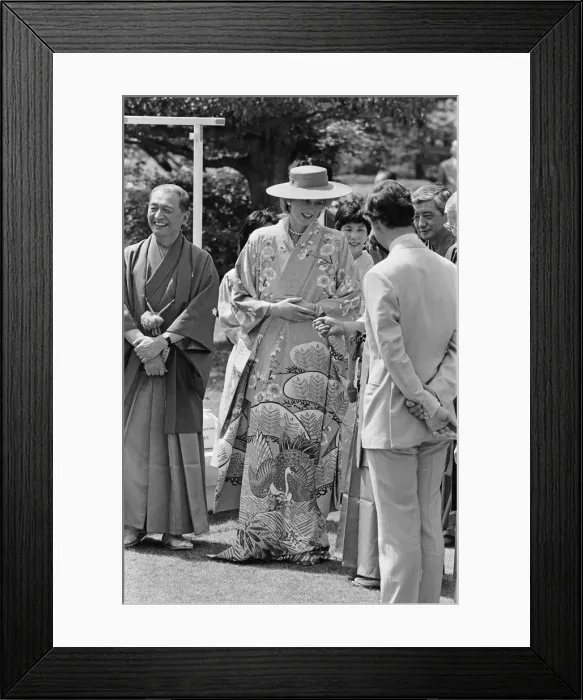 Framed Print : HRH Princess Diana, The Princess of Wales, is helped by city officials to wear a Framed Print : HRH Princess Diana, The Princess of Wales, is helped by city officials to wear a