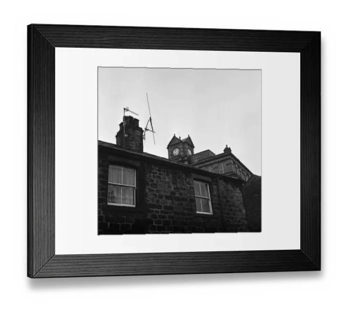 Framed Print : Clock on top of Eagley Mills, which is closing. Eagley, near Bolton, Greater Manchester