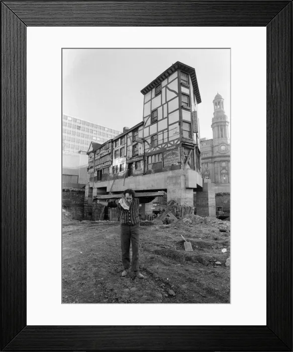 Framed Print : Manchesters oldest building, the Shambles, is rising to new heights Framed Print : Manchesters oldest building, the Shambles, is rising to new heights