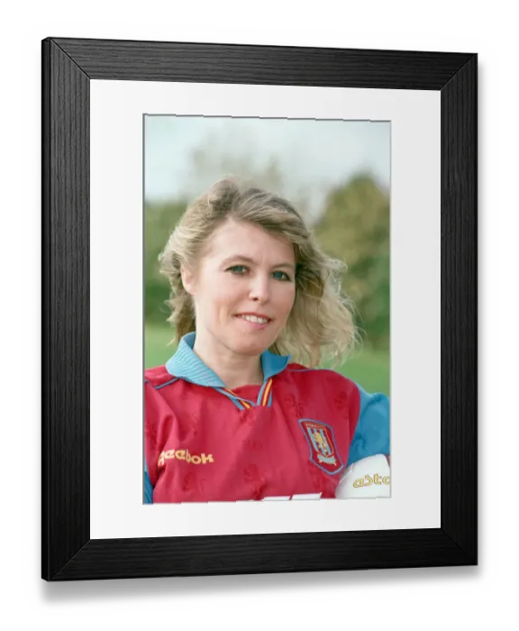 Framed Print : BBC Radio WM presenter Julie Mayer in an Aston Villa kit at the club