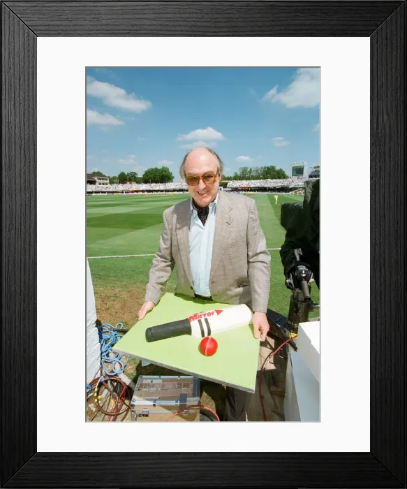 Framed Print : Cricket commentator Henry Blofeld is presented with a Daily Mirror cake in the shape of a