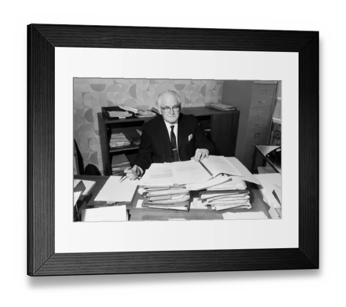 Framed Print : Mr Eric Jackson, deputy town clerk of Irlam UDC, amongst the files of his campaign