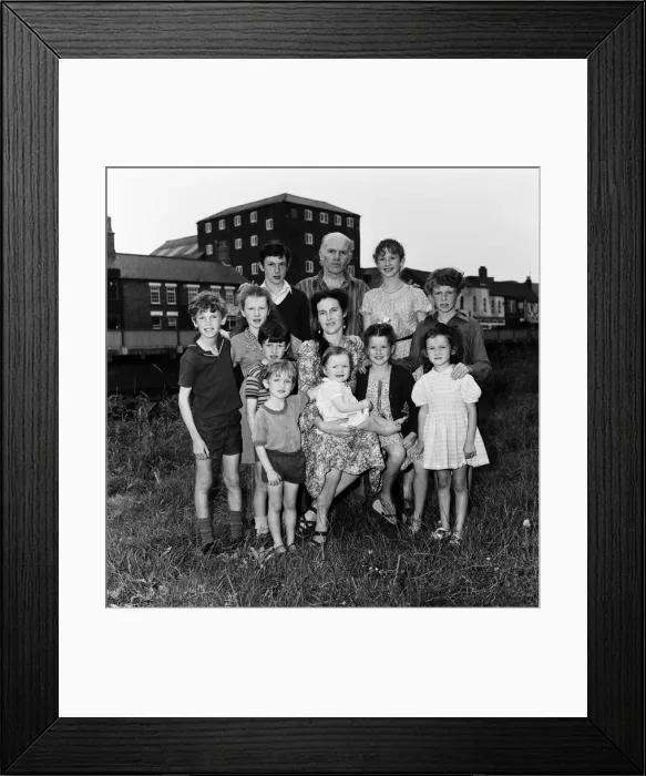 Framed Print : Gordon Gillick with his wife Victoria Gillick and their ten children at home in Wisbech