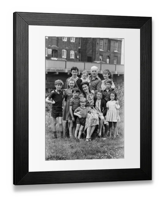 Framed Print : Gordon Gillick with his wife Victoria Gillick and their ten children at home in Wisbech Framed Print : Gordon Gillick with his wife Victoria Gillick and their ten children at home in Wisbech