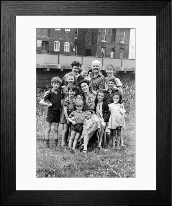 Framed Print : Gordon Gillick with his wife Victoria Gillick and their ten children at home in Wisbech Framed Print : Gordon Gillick with his wife Victoria Gillick and their ten children at home in Wisbech