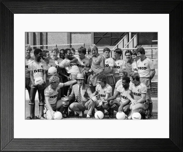 Framed Print : Watford FC chairman Elton John with Watford football team at a photocall