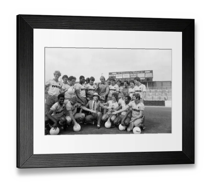 Framed Print : Watford FC chairman Elton John with Watford football team at a photocall Framed Print : Watford FC chairman Elton John with Watford football team at a photocall