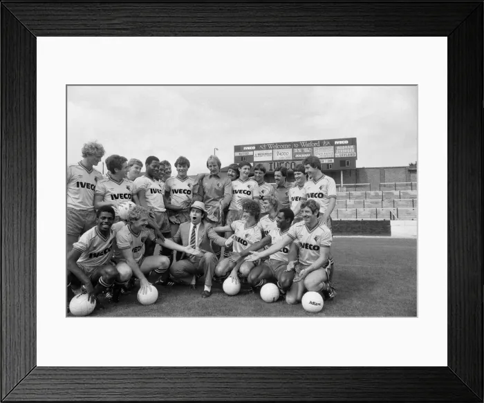 Framed Print : Watford FC chairman Elton John with Watford football team at a photocall Framed Print : Watford FC chairman Elton John with Watford football team at a photocall