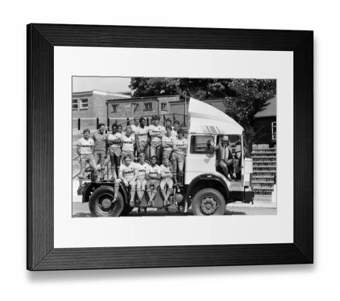 Framed Print : Watford FC chairman Elton John with Watford football team at a photocall