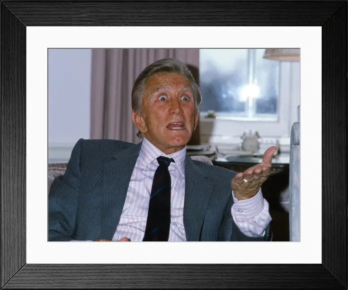 Framed Print : Kirk Douglas, who is appearing in the film Tough Guys'. April 1987 Framed Print : Kirk Douglas, who is appearing in the film Tough Guys'. April 1987