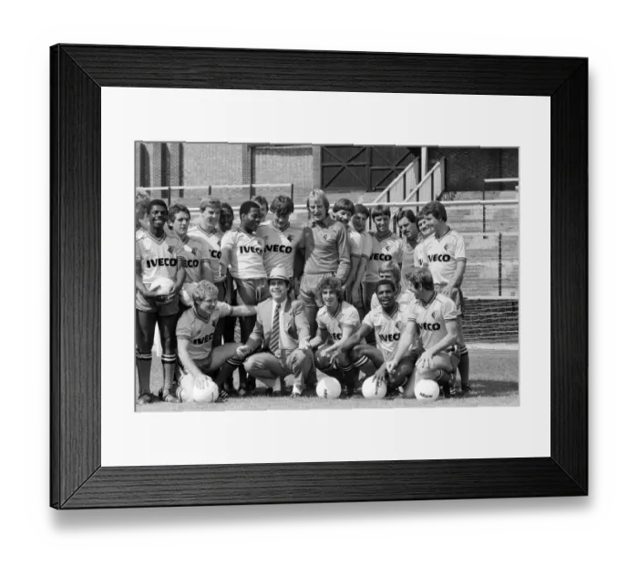 Framed Print : Watford FC chairman Elton John with Watford football team at a photocall