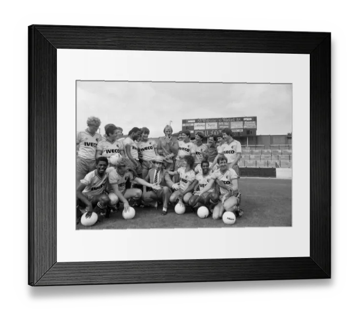 Framed Print : Watford FC chairman Elton John with Watford football team at a photocall