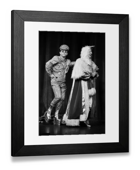 Framed Print : Elton John brings the house down in a charity show at Londons Theatre Royal Framed Print : Elton John brings the house down in a charity show at Londons Theatre Royal