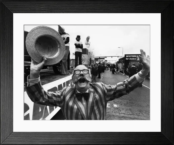 Framed Print : Jubilant Ray Tonken throws up a jubilant cheer as his Tom garner float moves off in Framed Print : Jubilant Ray Tonken throws up a jubilant cheer as his Tom garner float moves off in