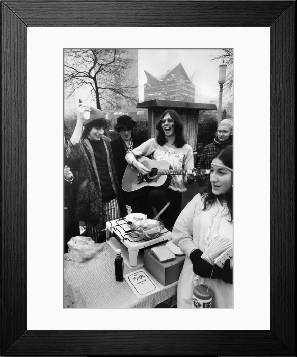 Framed Print : Students dressed in pyjamas and nightdresses brave the cold biting rain in Piccadilly Framed Print : Students dressed in pyjamas and nightdresses brave the cold biting rain in Piccadilly