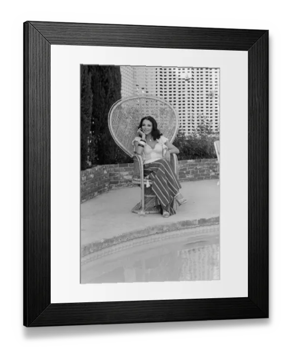 Framed Print : Actress Joan Collins has moved back to Hollywood. She has bought a luxurious home in Framed Print : Actress Joan Collins has moved back to Hollywood. She has bought a luxurious home in
