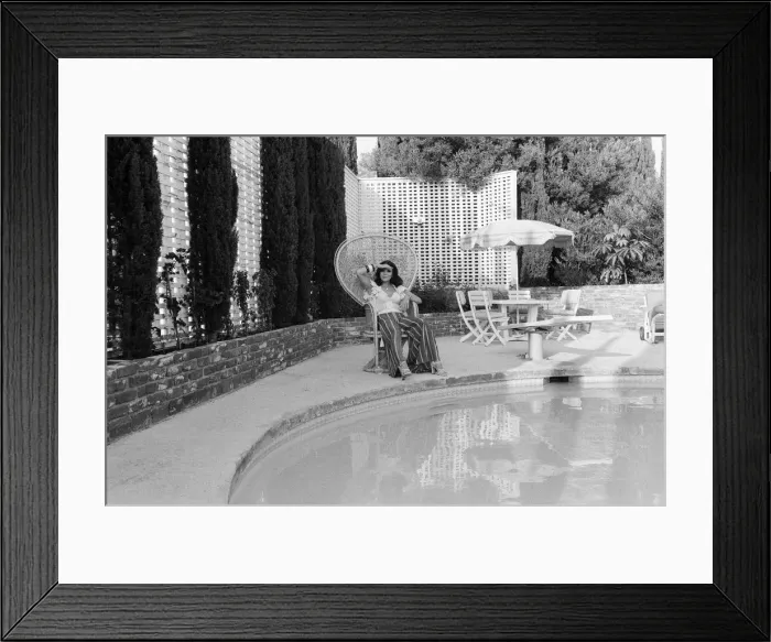 Framed Print : Actress Joan Collins has moved back to Hollywood. She has bought a luxurious home in Framed Print : Actress Joan Collins has moved back to Hollywood. She has bought a luxurious home in