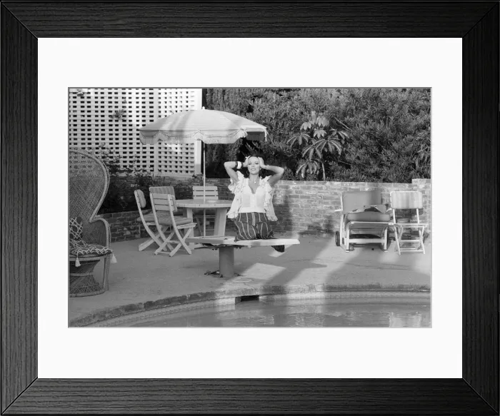 Framed Print : Actress Joan Collins has moved back to Hollywood. She has bought a luxurious home in Framed Print : Actress Joan Collins has moved back to Hollywood. She has bought a luxurious home in