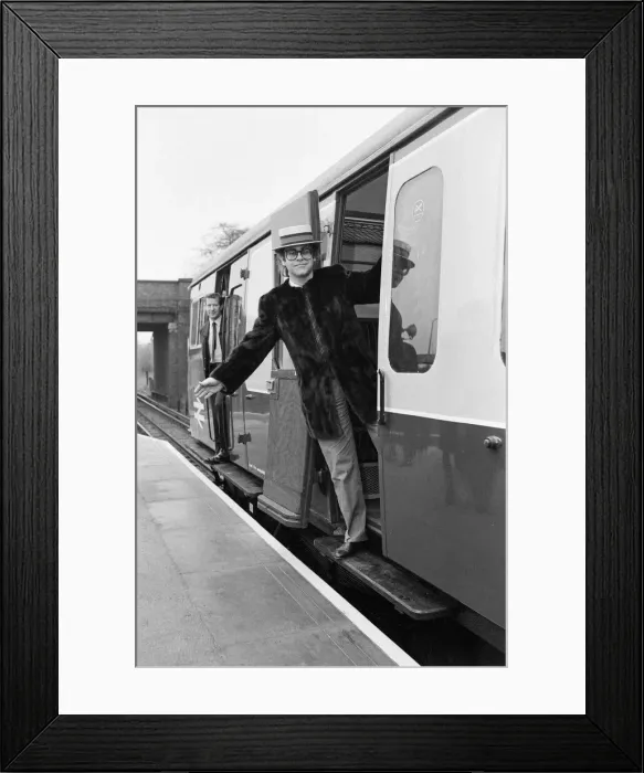 Framed Print : Pop star and Watford FC Chairman, Elton John, opens the new Watford Stadium Halt railway