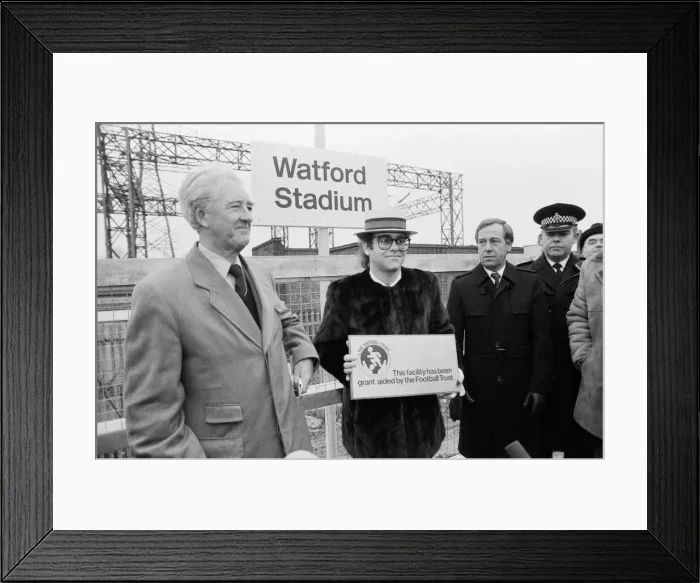 Framed Print : Pop star and Watford FC Chairman, Elton John, opens the new Watford Stadium Halt railway