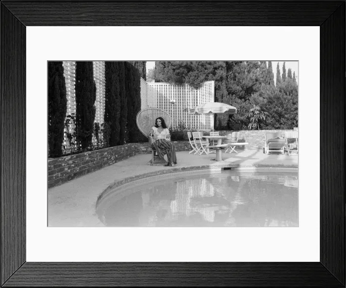 Framed Print : Actress Joan Collins has moved back to Hollywood. She has bought a luxurious home in Framed Print : Actress Joan Collins has moved back to Hollywood. She has bought a luxurious home in