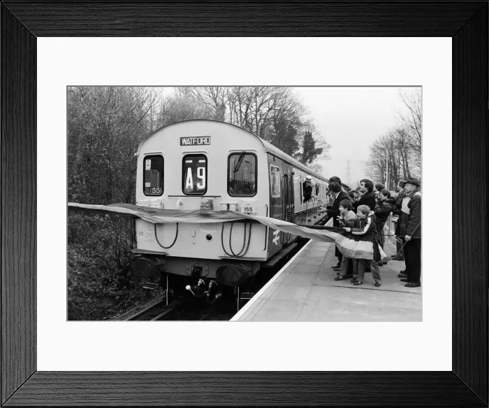 Framed Print : Pop star and Watford FC Chairman, Elton John, opens the new Watford Stadium Halt railway