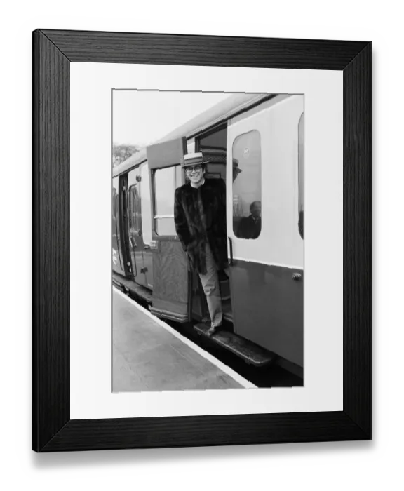 Framed Print : Pop star and Watford FC Chairman, Elton John, opens the new Watford Stadium Halt railway