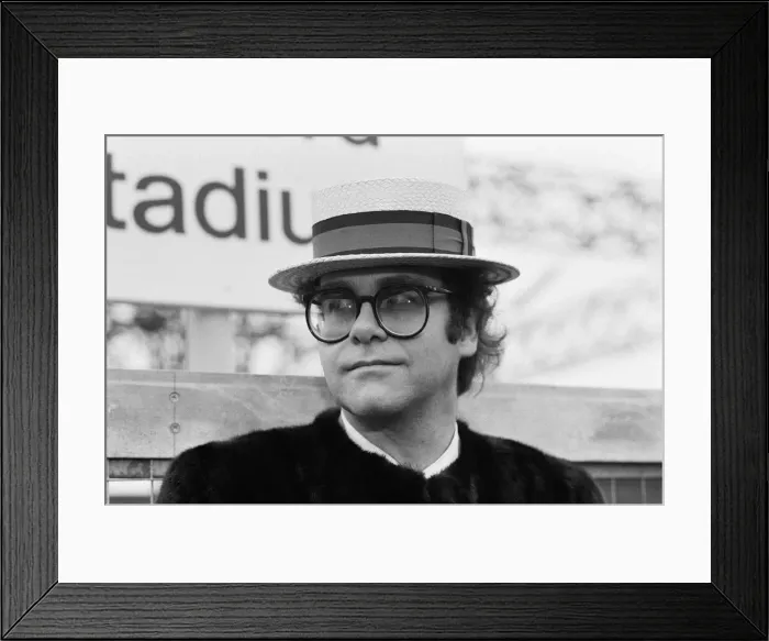 Framed Print : Pop star and Watford FC Chairman, Elton John, opens the new Watford Stadium Halt railway