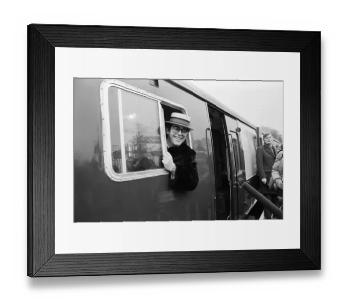 Framed Print : Pop star and Watford FC Chairman, Elton John, opens the new Watford Stadium Halt railway