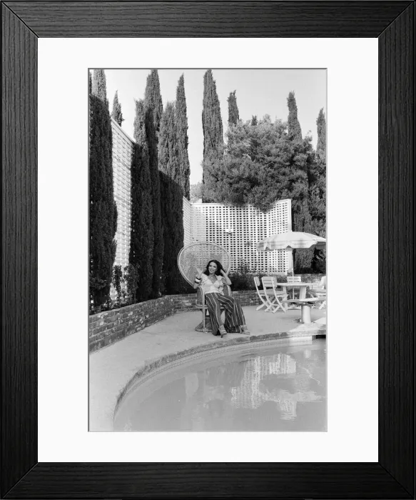 Framed Print : Actress Joan Collins has moved back to Hollywood. She has bought a luxurious home in