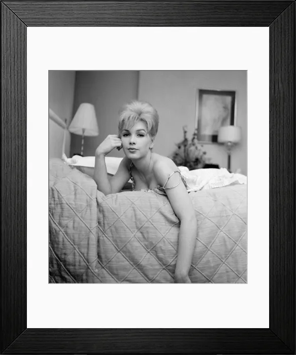 Framed Print : Stella Stevens, American film, television, and stage actress, pictured in her hotel suite Framed Print : Stella Stevens, American film, television, and stage actress, pictured in her hotel suite