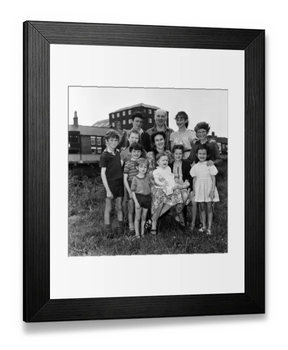 Framed Print : Gordon Gillick with his wife Victoria Gillick and their ten children at home in Wisbech Framed Print : Gordon Gillick with his wife Victoria Gillick and their ten children at home in Wisbech