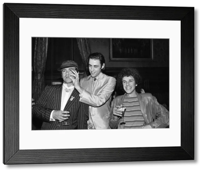 Framed Print : Elton John, Bob Geldof and Leo Sayer attending a House of Commons reception Framed Print : Elton John, Bob Geldof and Leo Sayer attending a House of Commons reception