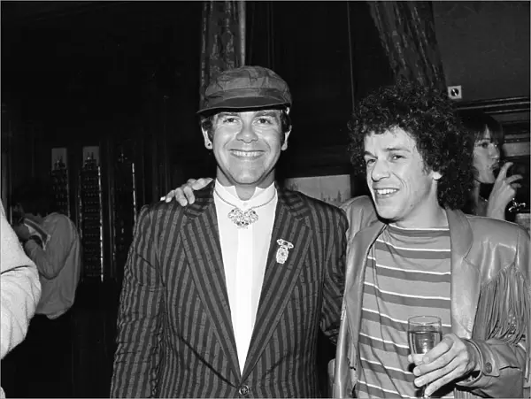 Elton John and Leo Sayer attending a House of Commons reception
