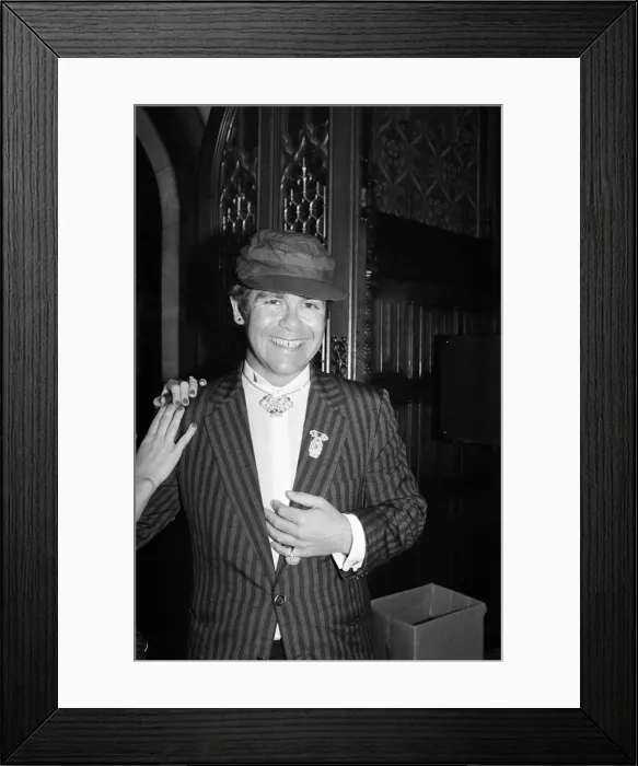 Framed Print : Elton John attends a House of Commons reception, invited along with other pop stars by Framed Print : Elton John attends a House of Commons reception, invited along with other pop stars by