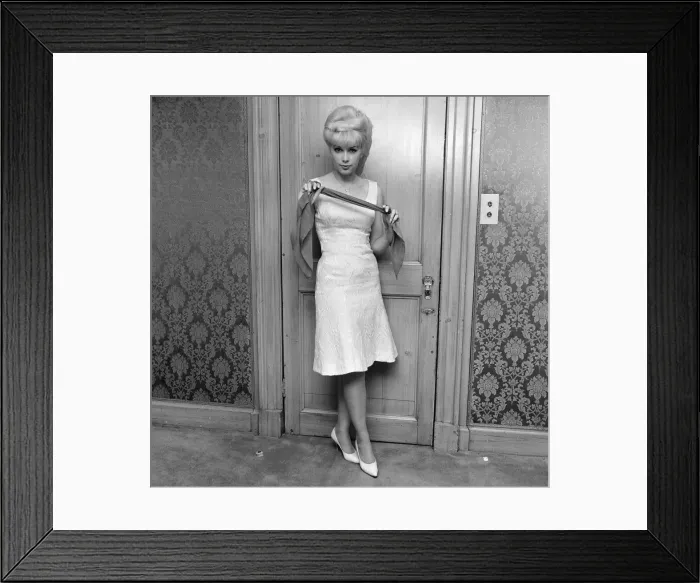 Framed Print : Stella Stevens, American film, television, and stage actress, pictured in hotel suite Framed Print : Stella Stevens, American film, television, and stage actress, pictured in hotel suite