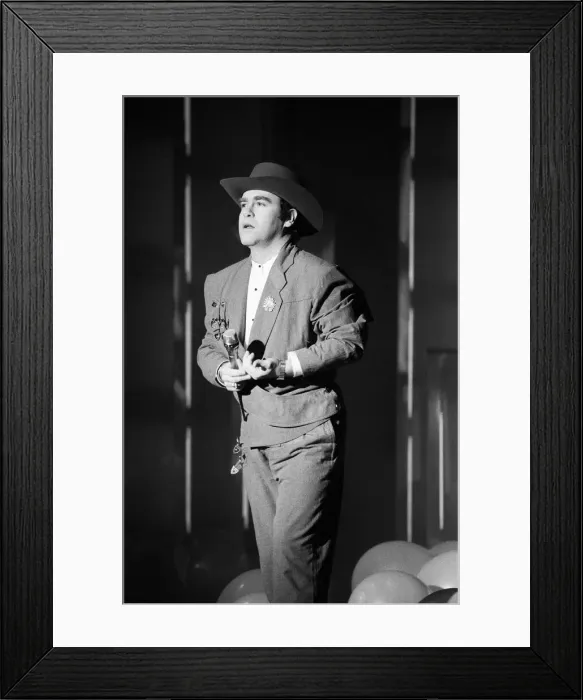 Framed Print : Elton John performing at the Montreaux Pop Festival. 18th May 1984 Framed Print : Elton John performing at the Montreaux Pop Festival. 18th May 1984