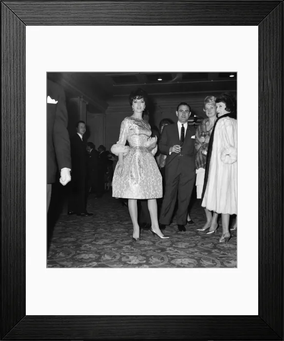 Framed Print : Joan Collins attends the wedding of Jackie Collins and Wallace Austin at Grosvenor House