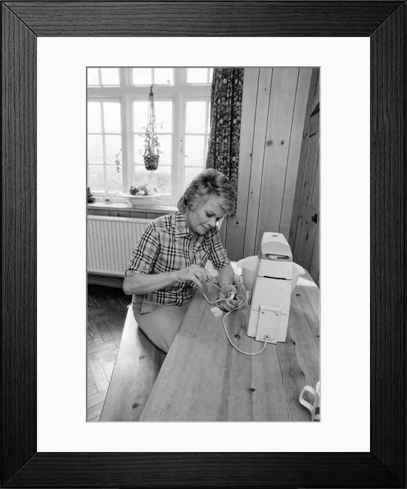 Framed Print : Judith Chalmers doing some DIY. May 1979 Framed Print : Judith Chalmers doing some DIY. May 1979