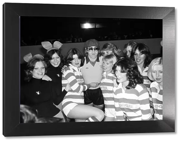Elton John pictured with Bunny Girls and Penthouse Pets during a 5 a side football match