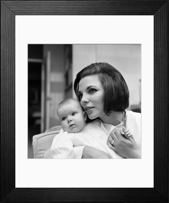 Framed Print : Joan Collins pictured with her four-month-old daughter Tara Newley Framed Print : Joan Collins pictured with her four-month-old daughter Tara Newley