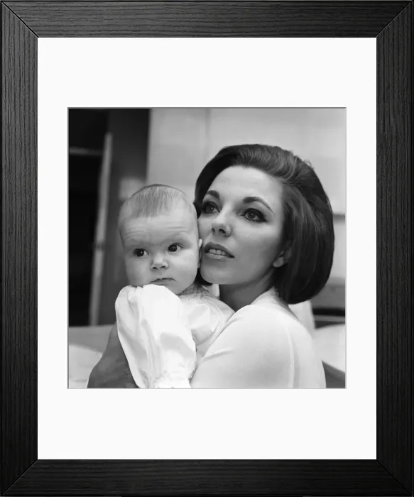 Framed Print : Joan Collins pictured with her four-month-old daughter Tara Newley Framed Print : Joan Collins pictured with her four-month-old daughter Tara Newley